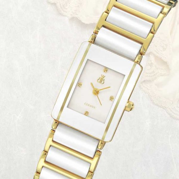 Reloj Eternal — Oro primera ley y cerámica blanca con esfera de nácar